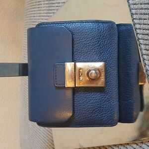Furla Leather Wallet. Fading on hardware.